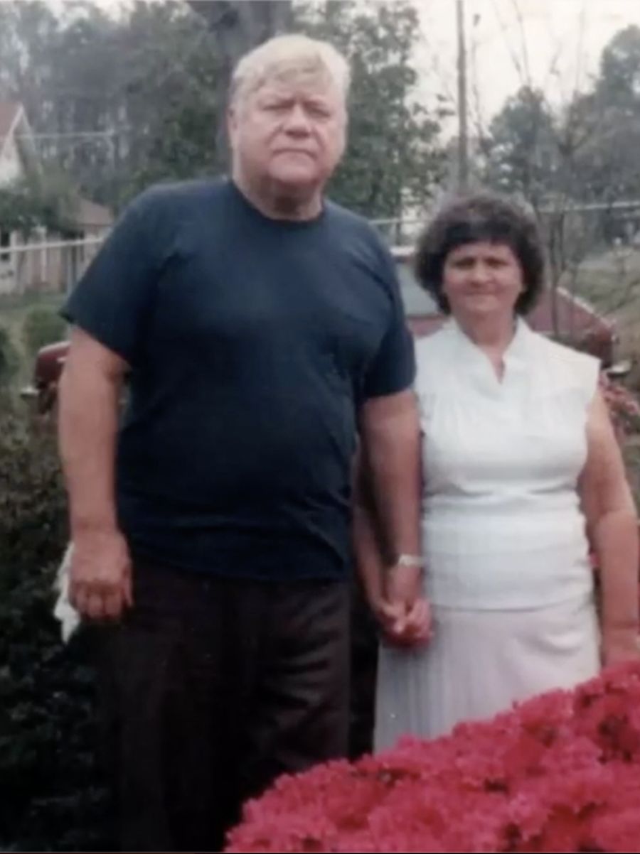 Papa and Brian's grandmother outside their home